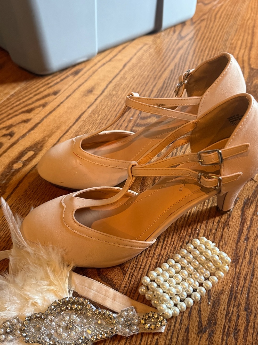 Women’s flapper T-Strap Mid Heel Pumps in Nude and accessories